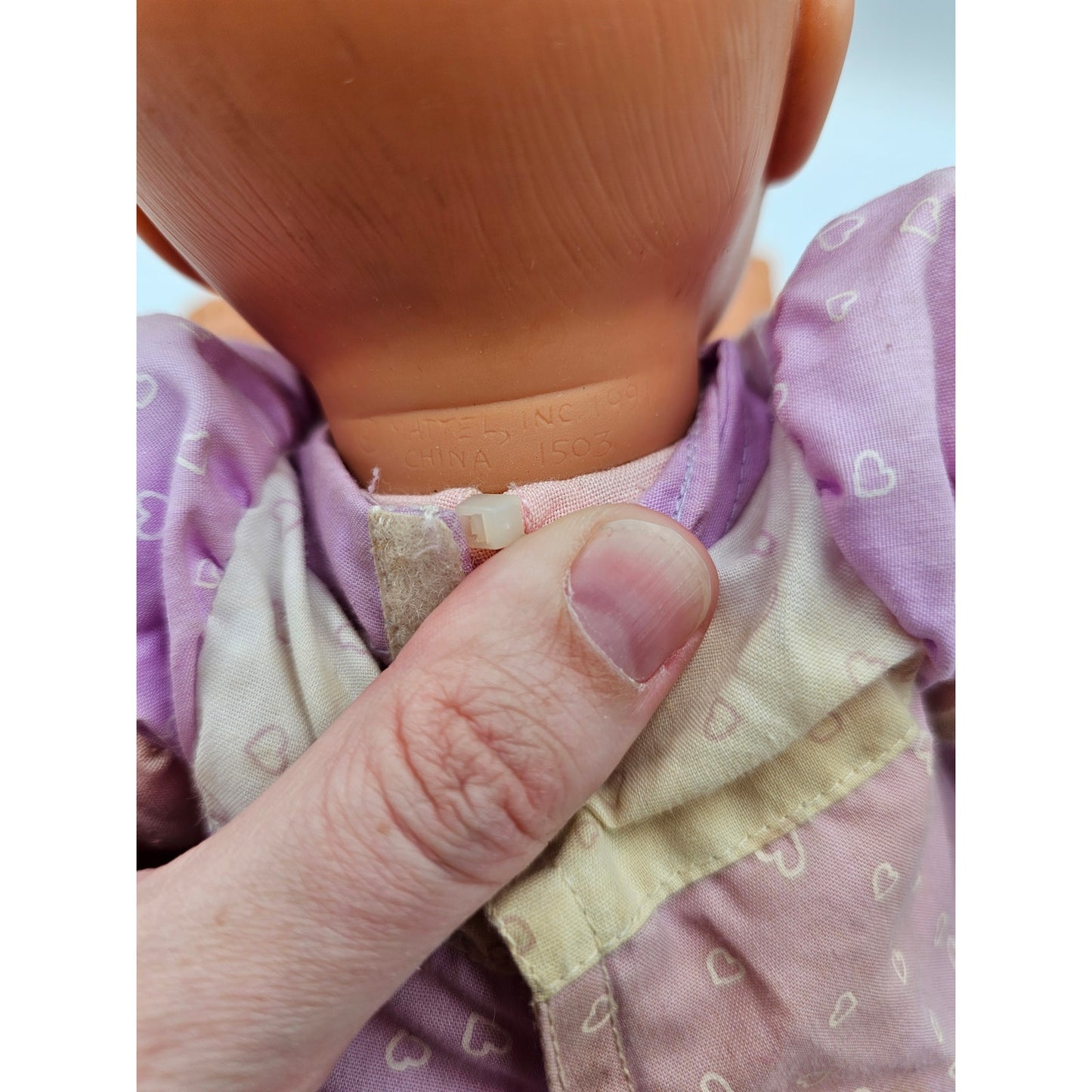 Vintage 1999 Mattel Baby Doll Vinyl Cloth Purple Dress Grumpy Face