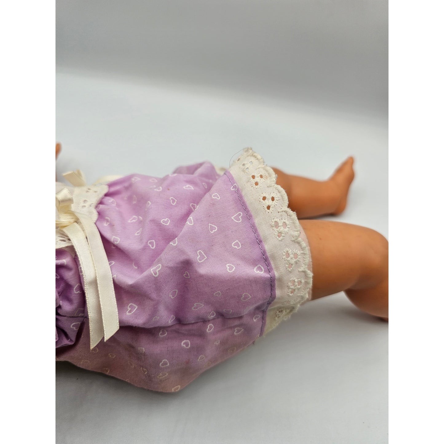 Vintage 1999 Mattel Baby Doll Vinyl Cloth Purple Dress Grumpy Face