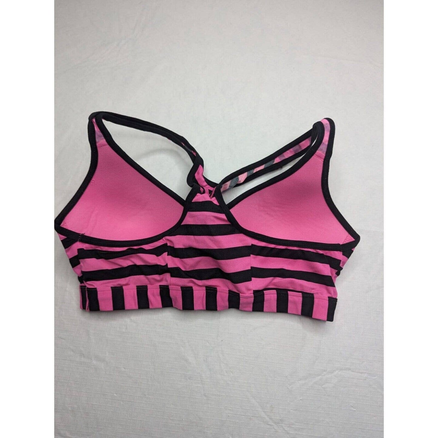 SO Mujeres Sz M Sujetador deportivo ligeramente acolchado Rosa Negro Rayas