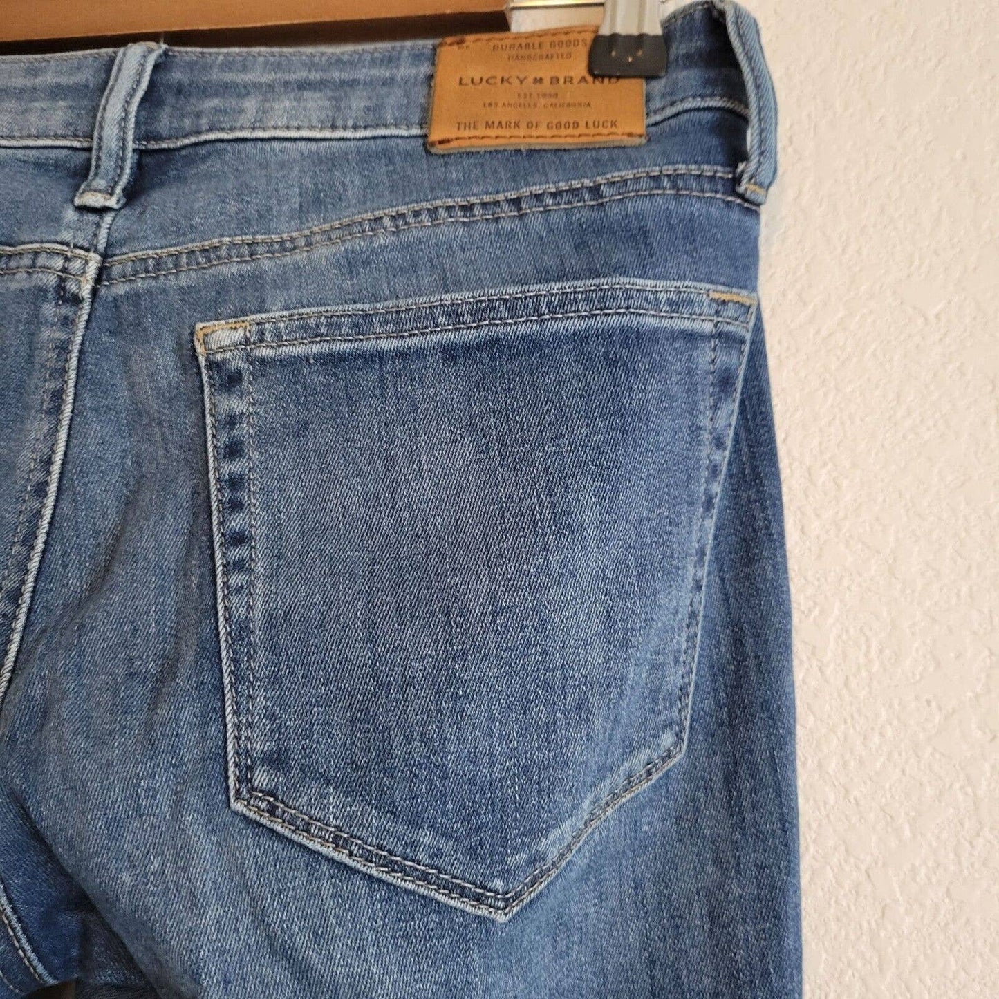 Lucky Brand Jeans azules con corte de bota clásico para mujer, talla 2, lavado medio