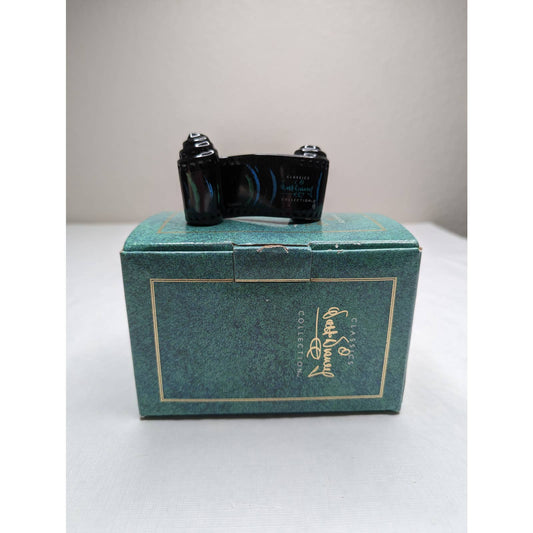 Figura decorativa de la hora sinfónica del título de apertura de la colección Disney Classics